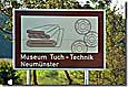 Autobahnschild Museum Tuch und Technik